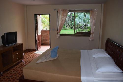 索菲亚花园度假酒店客房内的一张或多张床位