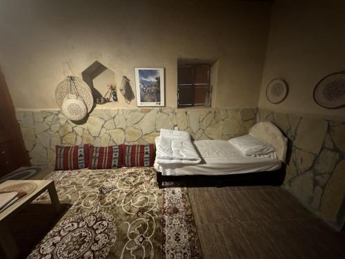 Fanja Heritage House客房内的一张或多张床位
