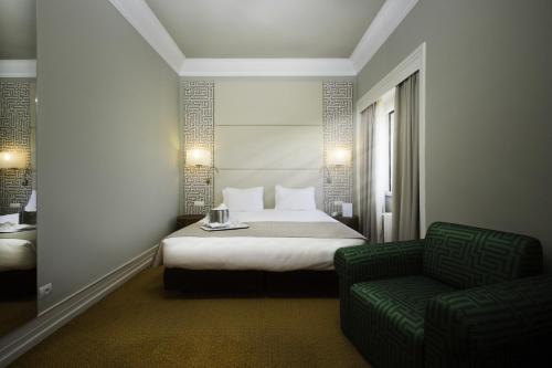 麦拉帕奎酒店客房内的一张或多张床位