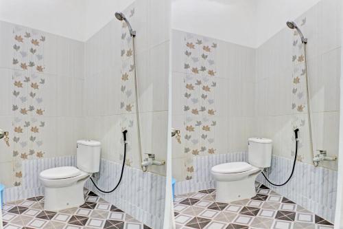 班达楠榜OYO 92945 Guest House Nusa Indah Syariah的一间设有两个卫生间的浴室