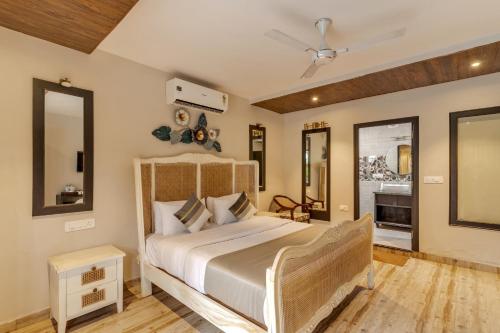 Le dando Beach Resort by Orion Hotels客房内的一张或多张床位