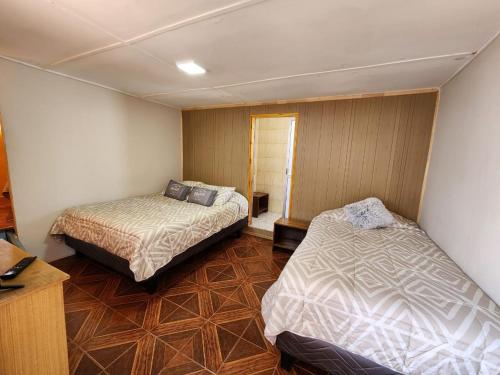 HOSTAL SOL ATACAMA -CALDERA客房内的一张或多张床位