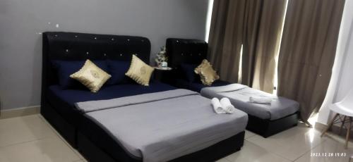 Syanaz Studio Apartment客房内的一张或多张床位