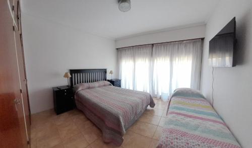 Duplex en Punta Mogotes客房内的一张或多张床位