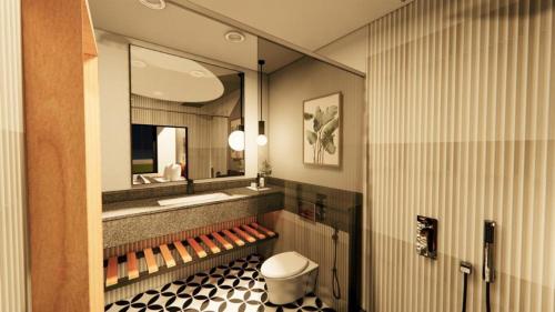 勒克瑙Vintclub Resort的一间带水槽、卫生间和镜子的浴室