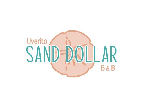 拉斯塔布拉斯Uverito Sand Dollar B&B的沙条标志