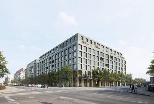 卢布尔雅那Luxury Apartment Ljubljana的一条城市街道上的白色大建筑