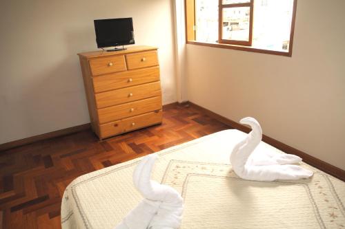 Inkawasi Miraflores Hostel客房内的一张或多张床位