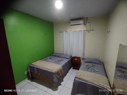Pousada Luz - Santo Amaro do Maranhão客房内的一张或多张床位