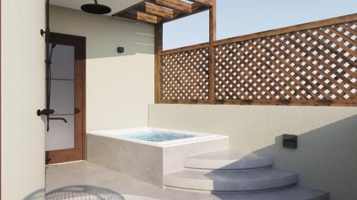 Megálon ChoríonUtopia Luxury Resort的带浴缸、淋浴和楼梯的浴室