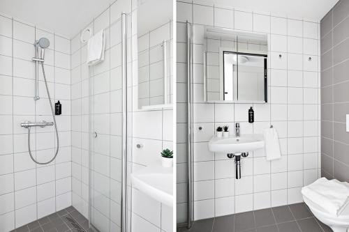 胡丁厄Forenom Hotel Flemingsberg - 10min from Älvsjö的带淋浴和盥洗盆的白色浴室