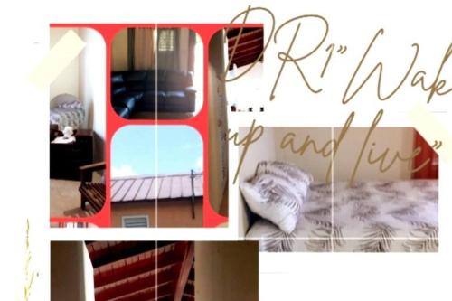 Spanish TownD'RESORT WAKE UP AND LIVE YAH的一张卧室的照片,卧室内配有一张床和镜子