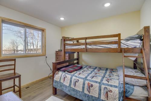Hines Vacation Rental with Grill Walk to Lake!的一间卧室设有两张双层床和一扇窗户。