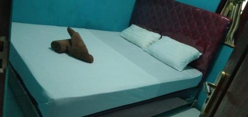 Raja Ampat Sandy Guesthouse客房内的一张或多张床位