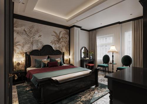 胡志明市Nicecy Saigon Hotel的一间卧室配有一张大床和一张书桌