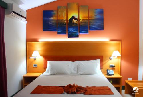 Pombas Brancas Hotel客房内的一张或多张床位