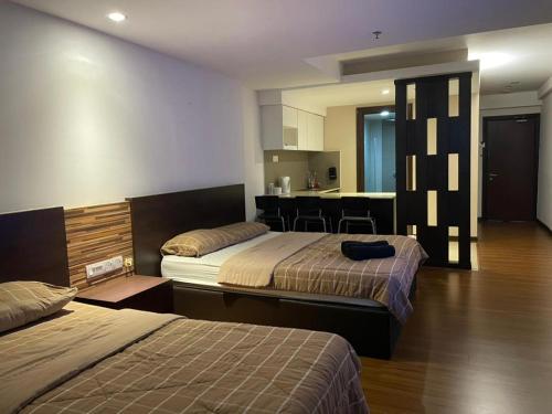 哥打巴鲁哥打巴鲁市点留宿公寓的酒店客房带两张床和厨房