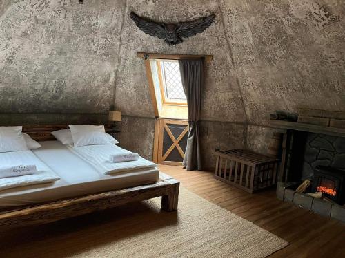 Excalibur miniHotel客房内的一张或多张床位