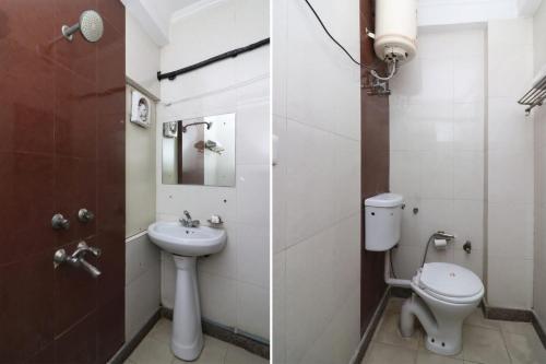新德里Oyo Hotel Luxury Inn Near Dhaula Kuan Delhi的一间带卫生间和水槽的浴室