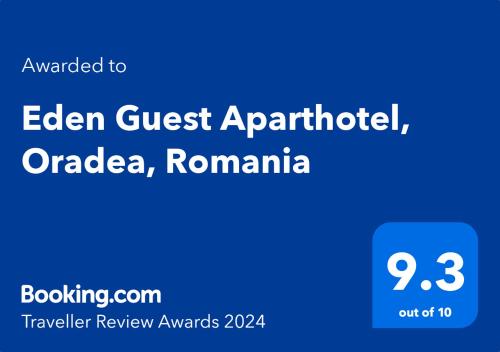 奥拉迪亚Eden Guest Aparthotel, Oradea, Romania的蓝色的标语,用词用反粒子或色素