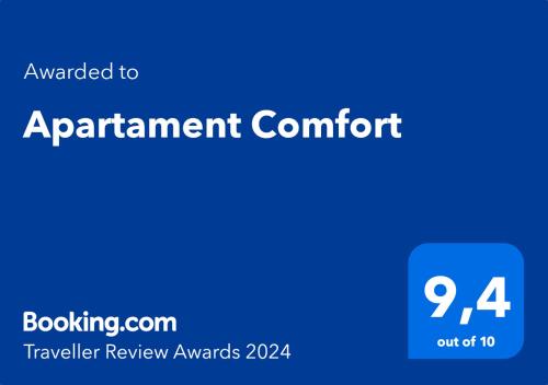 特兹萨茨Apartament Comfort的带有文本的蓝色标志,增加的注册