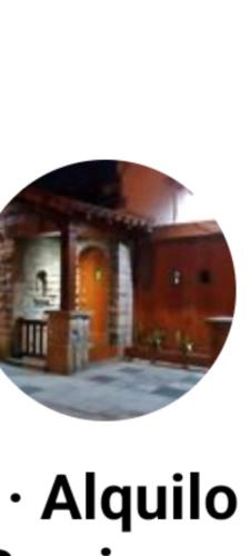马德普拉塔Hotel Marco的一张房子的照片,上面写着阿尔伯克基语