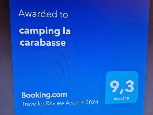 维亚斯camping la carabasse的一部手机的屏幕,上面有文字要露营的拉卡拉达萨