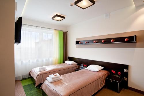 Młoda Europa客房内的一张或多张床位