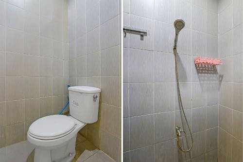 北加浪岸Super OYO 92437 Wahidin Guesthouse的一间带卫生间和淋浴的浴室