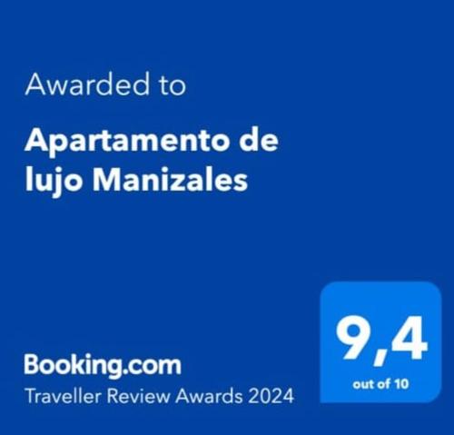 马尼萨莱斯Apartamento de lujo Manizales的蓝色的标语,写有toarmaarma de ubico手册