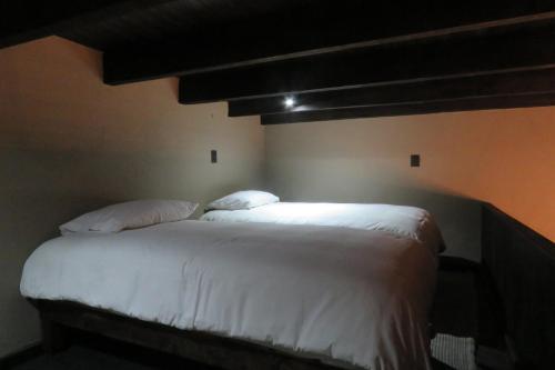 Hacienda Tovares客房内的一张或多张床位