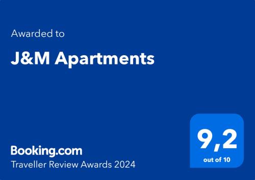 拉贝河畔乌斯季J&M Apartments的蓝色长方形,单词升级为jxm约会