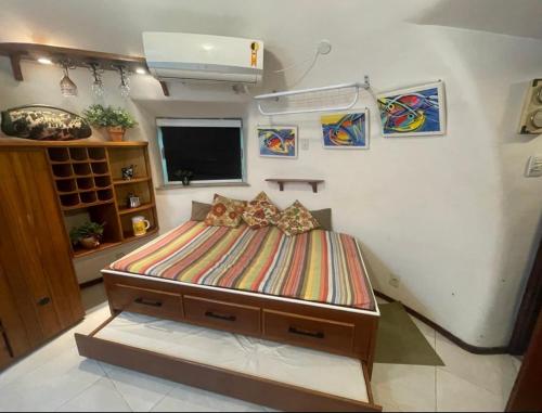 布希奥斯Cabana Bela Vista的卧室配有一张床