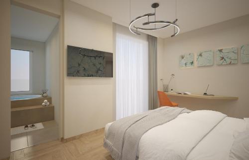 利多迪耶索罗卡瓦列利皇宫酒店的一间卧室配有一张床和一个吊灯