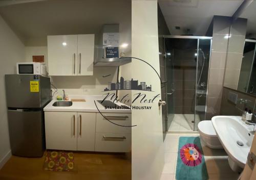马尼拉MetroNest Livingstone的一间带冰箱和水槽的小厨房