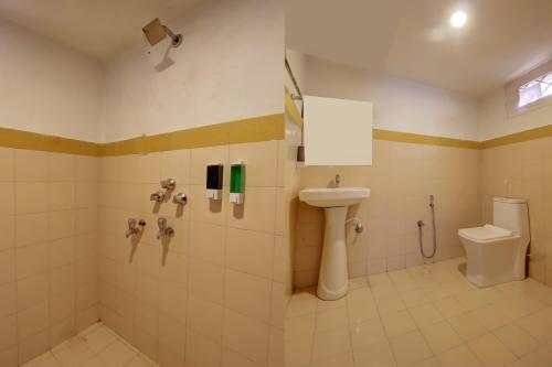 卡兰古特Calangute Cosy 1 bhk Apartment的一间带水槽和卫生间的浴室