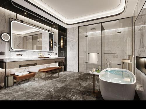 兰州兰州新区皇冠假日酒店的带浴缸和盥洗盆的浴室