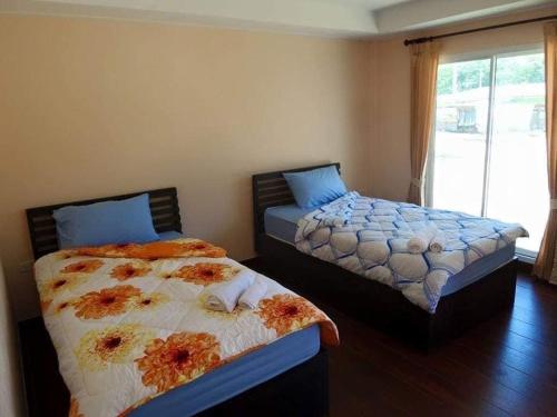 ํYada Resort Koh Yao Noi客房内的一张或多张床位
