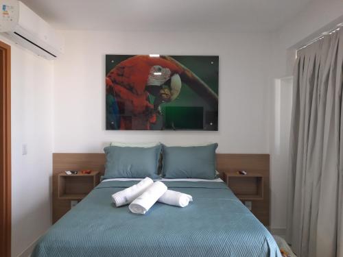 伊波茹卡Mana Beach Experience - Porto de Galinhas - Muro Alto Alto的一间卧室配有一张床,上面有两条毛巾