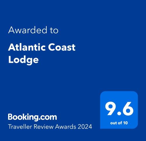 西班牙角Atlantic Coast Lodge的大西洋海岸山林小屋网页的截图