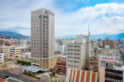 长野Kokusai 21 International Hotel的享有高楼城市美景