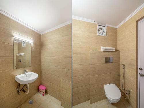 新德里Hotel South Indian的浴室的两张照片,配有卫生间和水槽