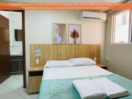 Residencial 364 - Localização privilegiada à 5min da praia客房内的一张或多张床位