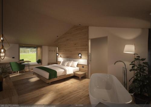 科雷多Pineta Nature Resort - Wellness & SPA的一间卧室配有一张床和一个浴缸