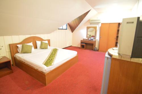 泰克诺江景度假酒店客房内的一张或多张床位