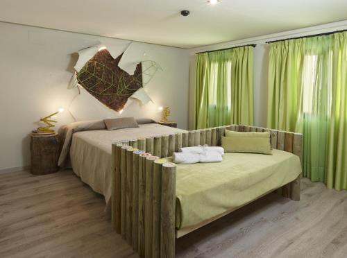 加莱里亚艾森提亚酒店客房内的一张或多张床位
