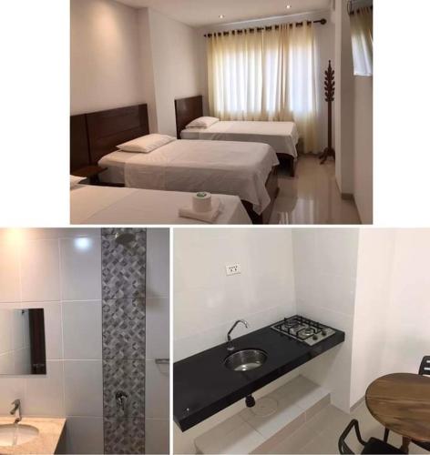 圣克鲁斯Hadasa的酒店客房设有两张床和盥洗盆