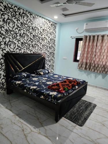 Manidweepa farm house客房内的一张或多张床位