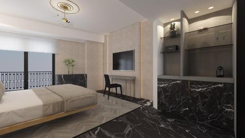 雅典Esse Athens的一间卧室配有一张床、一张书桌和一台电视。