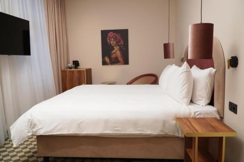 Hotel Pietryna客房内的一张或多张床位